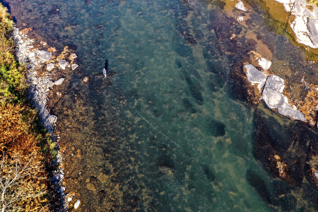 Angler swinging a river for trout