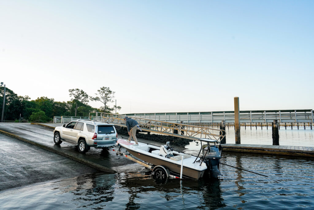 A guide launching a boat