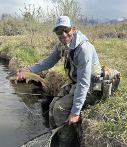 Matt Downs Smiling With Brown Trout