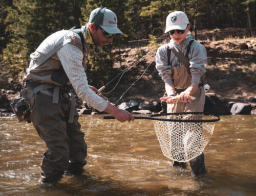 Matt Downs Catching Trout With Younger Angler